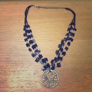 BLACK NECKLACE WITH SILVER MEDALLION